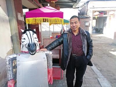  濮阳农民造出会摆臂拉车“机器人” 充满电可连续行走5小时